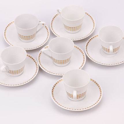 6 tasses et soucoupes en porcelaine blanche à motifs de points dorés 