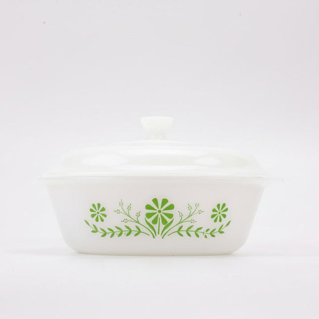 Plat à four Glasbake avec couvercle en opaline blanc avec motif floral vert
