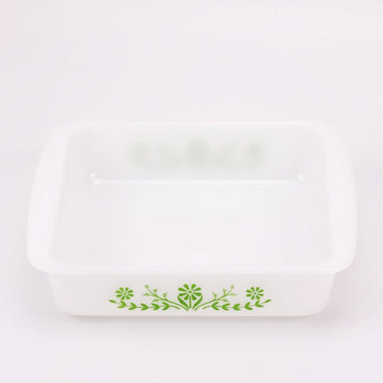 Plat à four carré Glasbake en opaline blanc avec motif floral vert
