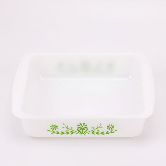 Plat à four carré Glasbake en opaline blanc avec motif floral vert