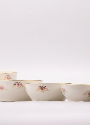 Ensemble de 5 saladiers Boch blancs et fleurs roses
