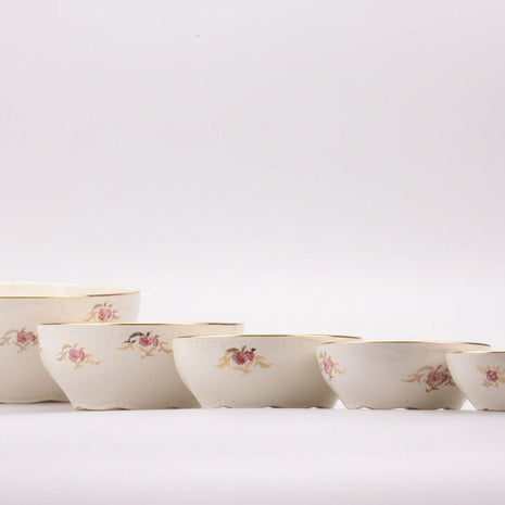 Ensemble de 5 saladiers Boch blancs et fleurs roses