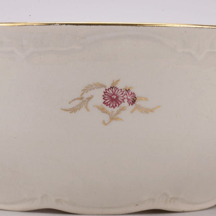 Ensemble de 5 saladiers Boch blancs et fleurs roses