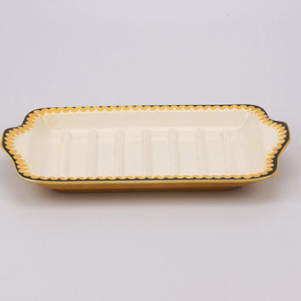 Plat de service Villeroy & Boch blanc cassé et liseret noir et jaune