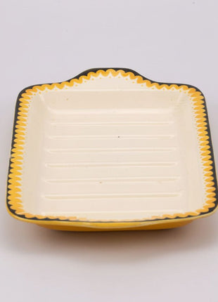 Plat de service Villeroy & Boch blanc cassé et liseret noir et jaune