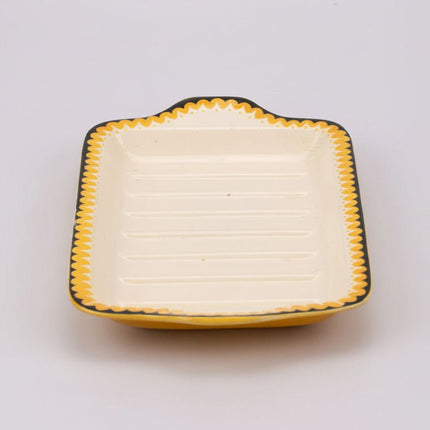 Plat de service Villeroy & Boch blanc cassé et liseret noir et jaune