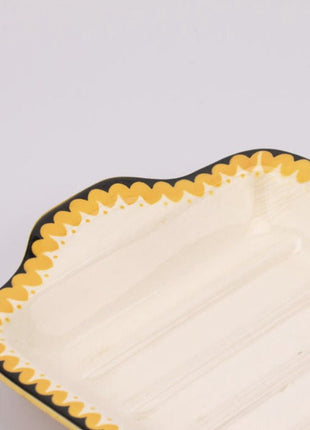 Plat de service Villeroy & Boch blanc cassé et liseret noir et jaune