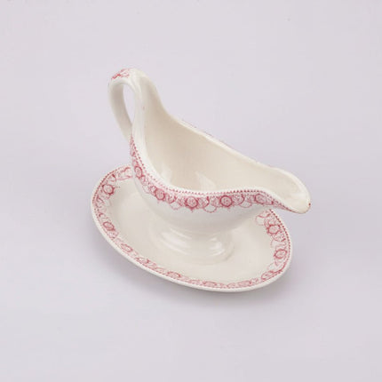Saucière en porcelaine blanche Boch Frères Ramona et motif rose