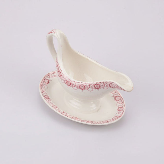 Saucière en porcelaine blanche Boch Frères Ramona et motif rose