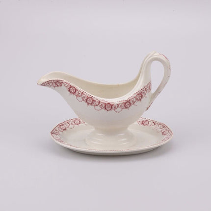 Saucière en porcelaine blanche Boch Frères Ramona et motif rose