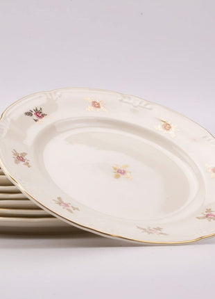10 Boch Frères dinner plates