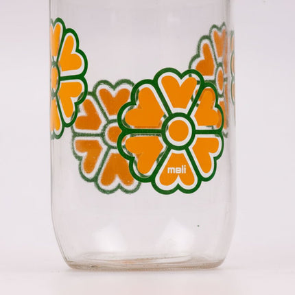 Pot en verre transparent et fleurs jaunes Meli 