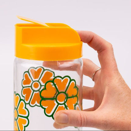 Pot en verre transparent et fleurs jaunes Meli 