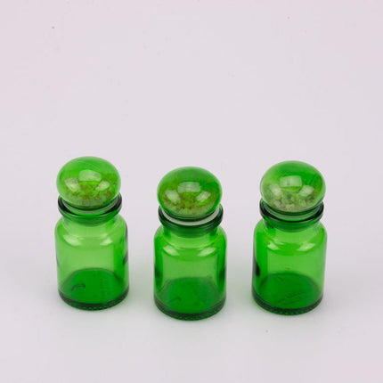 Trio de petits pots en verre vert