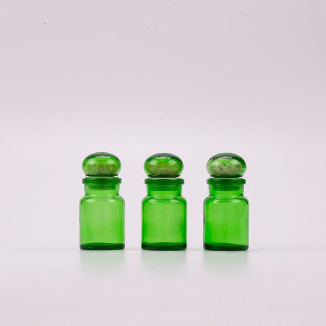 Trio de petits pots en verre vert