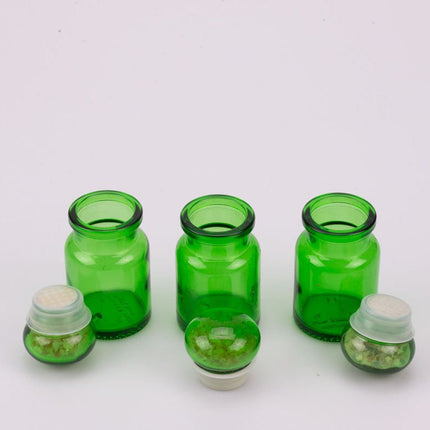Trio de petits pots en verre vert