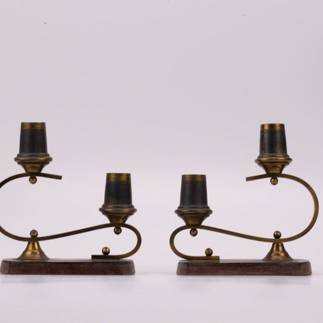 2 candlesticks made of metal, copper and wood