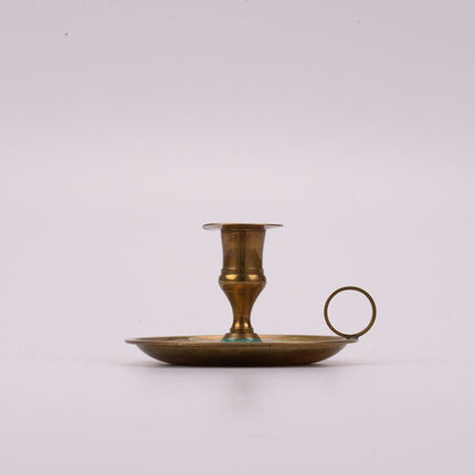 Brass hand candle holder