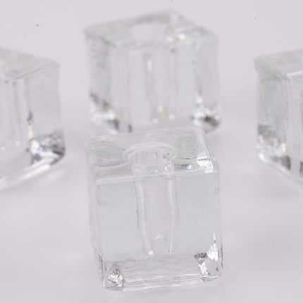 4 petits bougeoirs cubiques