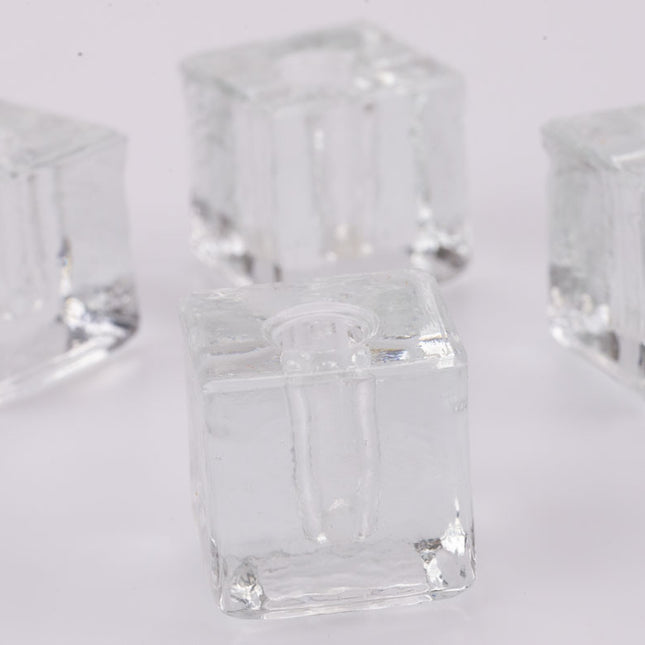 4 small cubic candle holders