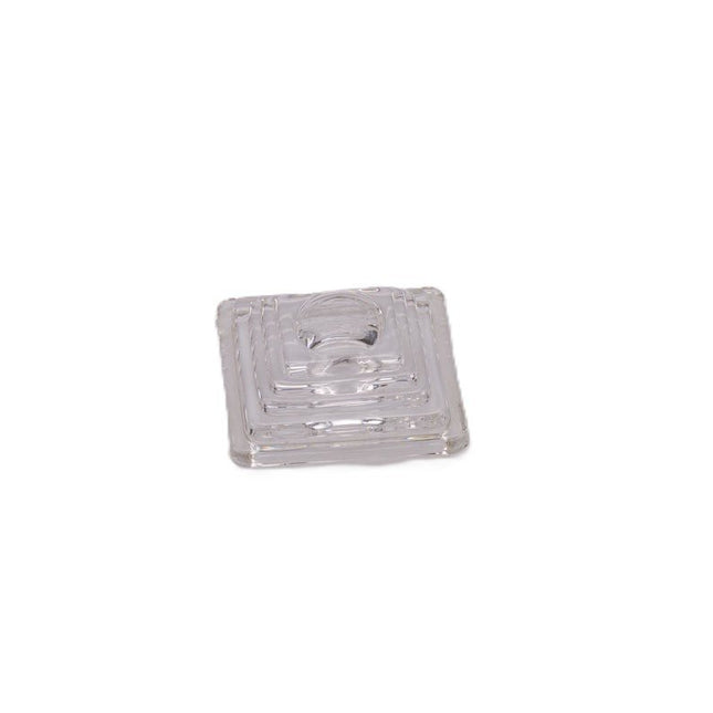 Bougeoir en verre à la forme pyramidale transparent