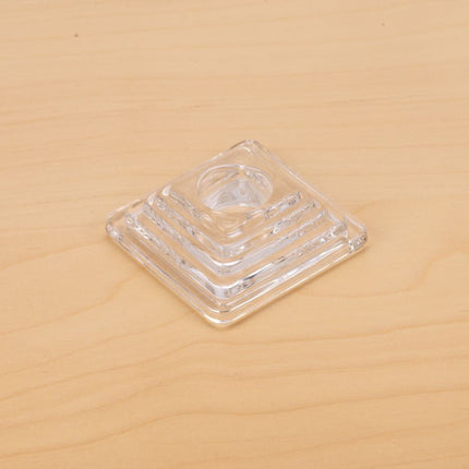 Bougeoir en verre à la forme pyramidale