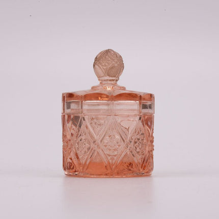 Petit pot rose en verre transparent avec couvercle