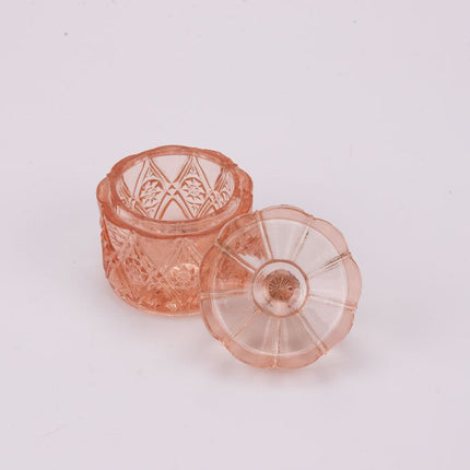 Petit pot rose en verre transparent avec couvercle