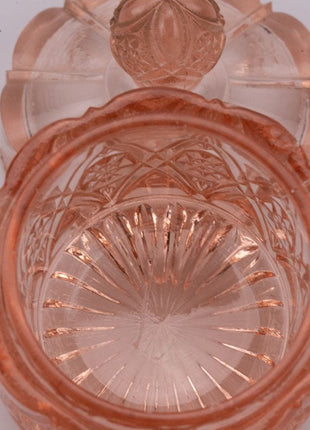 Petit pot rose en verre transparent avec couvercle