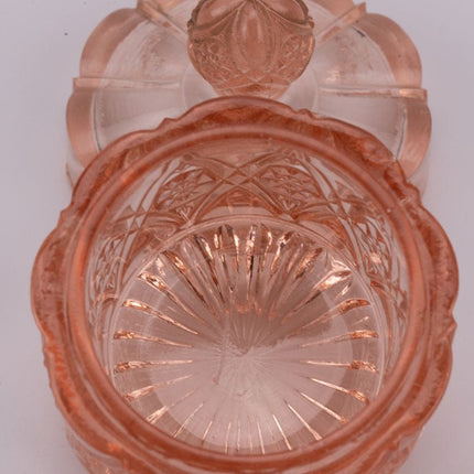 Petit pot rose en verre transparent avec couvercle