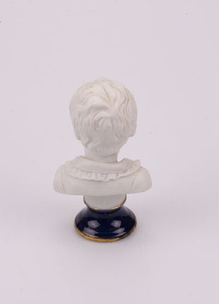 Bust of a little boy in Limoges biscuit porcelain