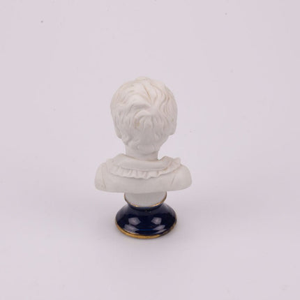 Bust of a little boy in Limoges biscuit porcelain