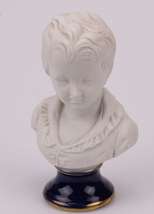 Bust of a little boy in Limoges biscuit porcelain