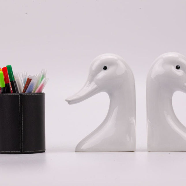 2 serre-livres canard blanc en porcelaine Hier Vullen met Zand