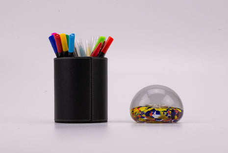 Boule sulfure en verre tapis floral multicolore et croix argentée