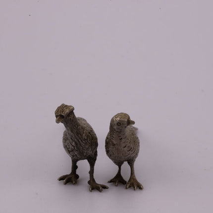 2 petits faisans de déco de table argentés