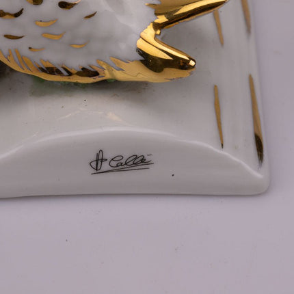 Couple de cygnes en porcelaine blanc et doré