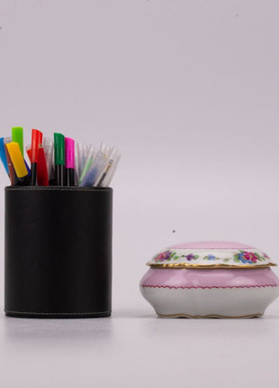 Bonbonnière en porcelaine Limoges rose avec motifs fleuris