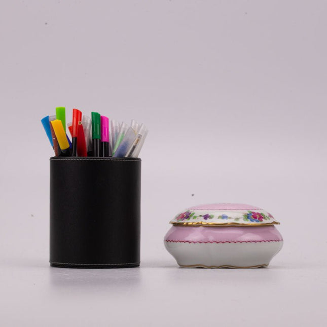 Bonbonnière en porcelaine Limoges rose avec motifs fleuris