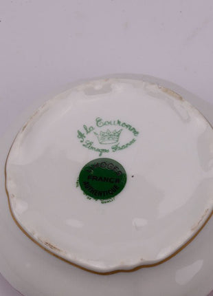Bonbonnière en porcelaine Limoges rose avec motifs fleuris