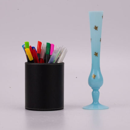 Vase soliflore bleu vintage et motifs dorés