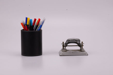 Perforatrice vintage en métal argenté