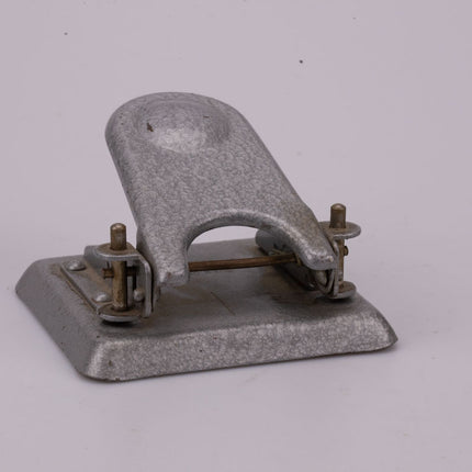 Perforatrice vintage en métal argenté