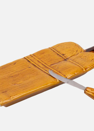 Planche à fromage jaune avec son couteau