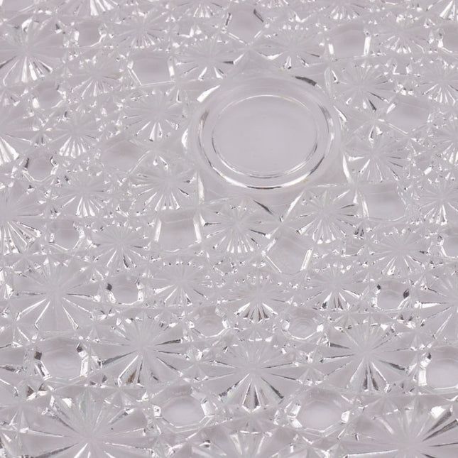 Plat en cristal sculpté aux motifs géométriques