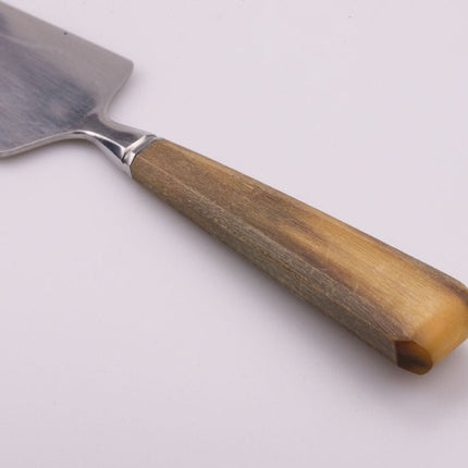 Pelle à tarte en inox marron