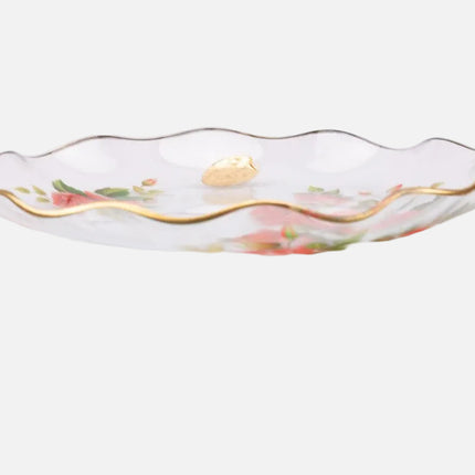 Plat en verre transparent au bord doré et motifs fleuris rouges