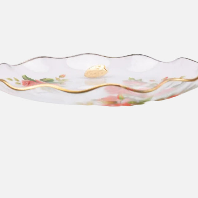 Plat en verre transparent au bord doré et motifs fleuris rouges