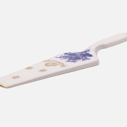 Pelle à tarte en porcelaine blanche et fleurs bleues