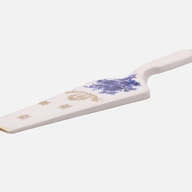 Pelle à tarte en porcelaine blanche et fleurs bleues